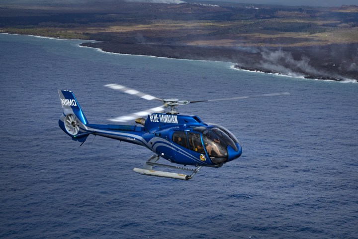 a plane flying over a body of water