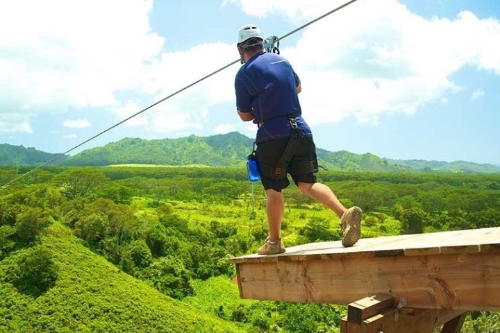 a man on a zipline plateform