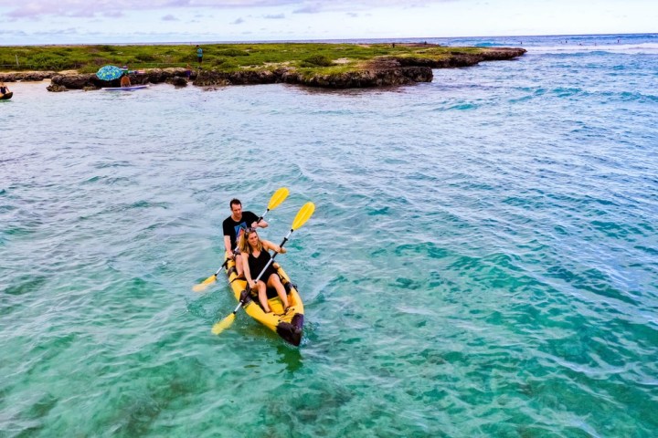 a man kayaking